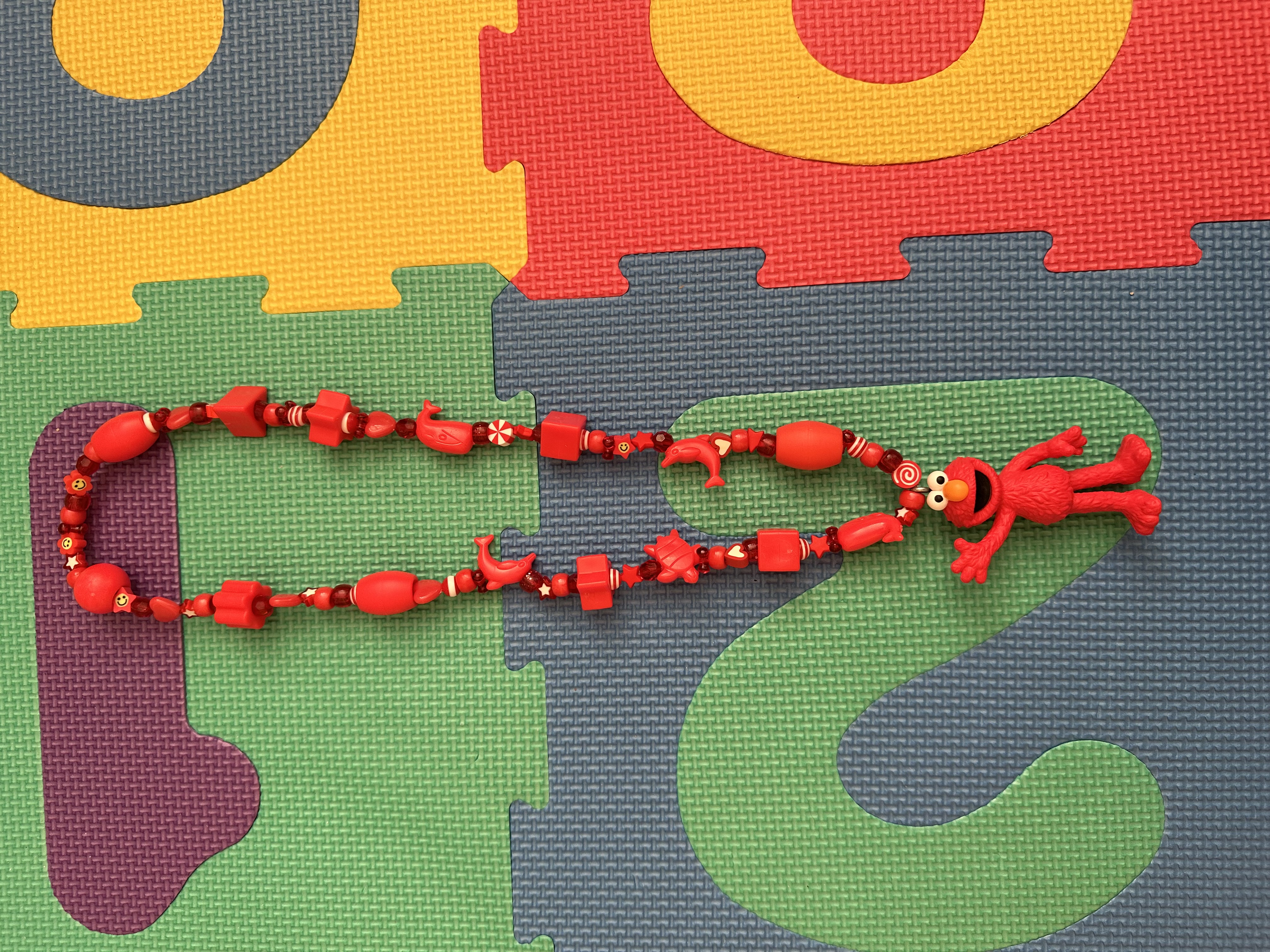 Red Figurine Necklace