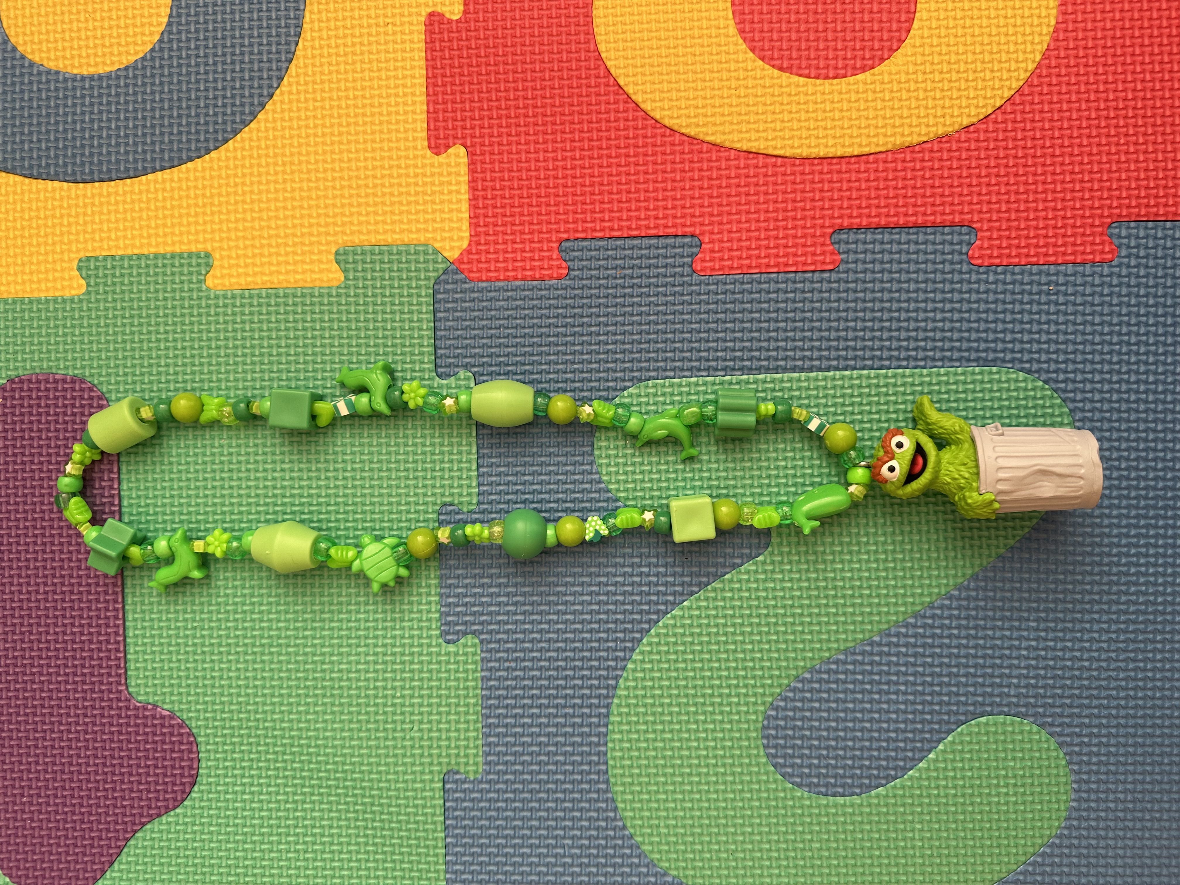 Green Figurine Necklace